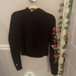 HOLLISTER- black with roses sweatshirt